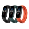 Kép 1/4 - Mi Smart Band 5 pót pánt szett - Fekete/Narancs/Kékeszöld